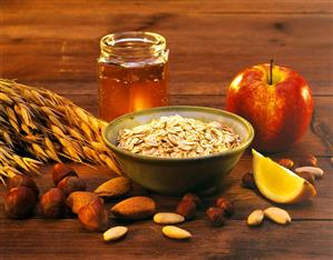 Ingredients for Bircher muesli: oats, honey, apple, nuts