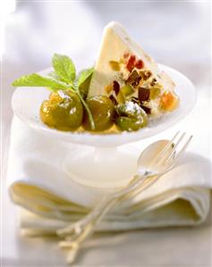 Nougat parfait with hot mirabelles in a bowl (1)