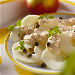 Apple carpaccio with horseradish dressing, capers and herbs