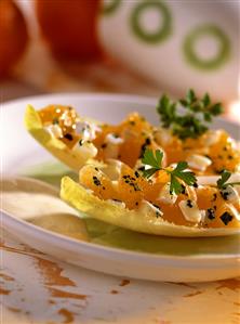 Chicory cheese boats with mandarins and yoghurt sauce