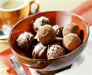 Cappuccino chocolates in red bowl