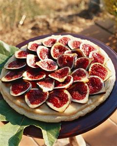 Fig tart on a plate in the open air