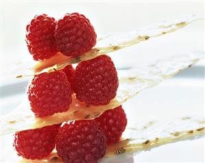 Fresh raspberries between sheets of anise filo pastry