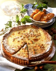 Fruity nut tart with pears and hazelnuts