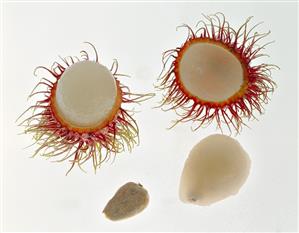 Rambutan, halved and peeled with stone