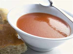 Tomato soup in a white soup dish