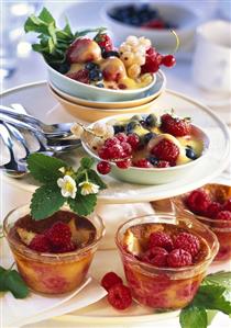 Small raspberry puddings and berries with port zabaione