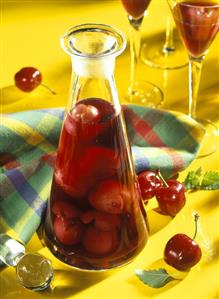 Cherries in rum in a carafe