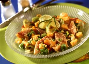 Trout salad with melon dressing and papaya