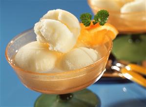 Lemon and orange sorbet in champagne bowl