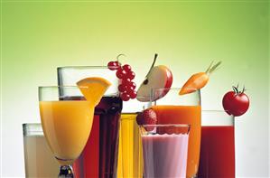 Various fruit and vegetable juices in glasses