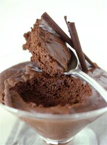 Mousse au chocolat in a glass and on a spoon