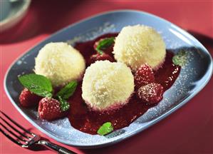 Coconut balls with raspberry sauce and fresh mint (2)