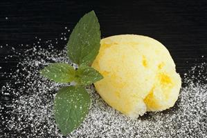 Lemon sorbet on black background