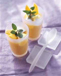 Peach soup with elderflower mousse in glasses