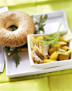 Chicken fillet with fennel and oranges; bagel with rocket (2)