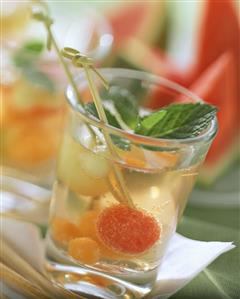 Melon drink with fresh mint in glass