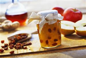 Apple and ginger preserve with Calvados raisins in jar