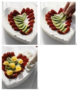 Decorating Mother's Day heart with fruit and cream