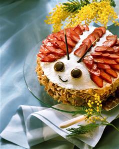 Strawberry marzipan cake, decorated as beetle, on plate (2)