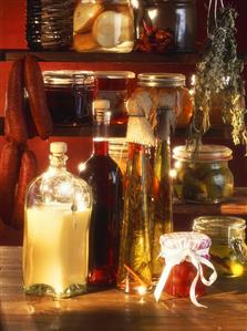 Various preserving jars, sausages, oils etc, in pantry