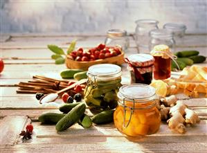 Still life with bottled vegetables, jams & ingredients