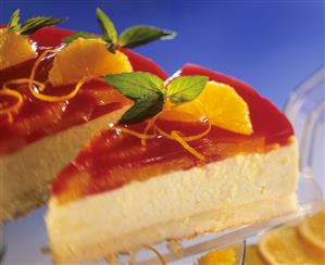 Campari and orange cheesecake with mint leaves