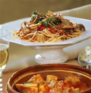 Spaghetti with clams and stockfish and potato soup