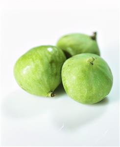 Three fresh green figs