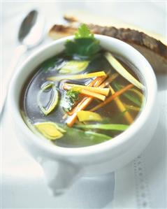 Consomme with vegetables and parsley