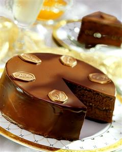 Sacher torte, a piece cut, on festive plate