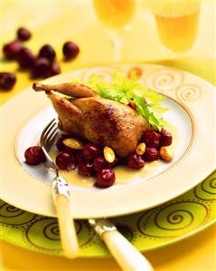 Roast quail with cherry and almond sauce