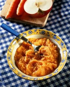 Apple and carrot puree on plate