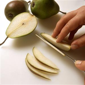 Thinly slicing pears