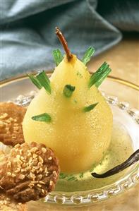 Poached pear with angelica root and almond biscuit