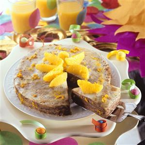 Pancake cake with chocolate and orange segments