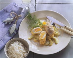 Plaice rolls with orange on cucumber; rice