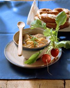 Munich pretzel soup with onions and radishes