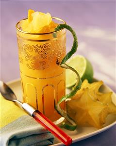 Orange and lime drink with carambolas