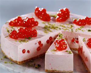 Yoghurt cake with red currants and pistachios