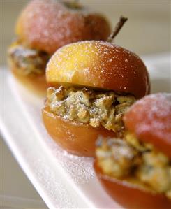 Baked apples with marzipan & almond filling and icing sugar