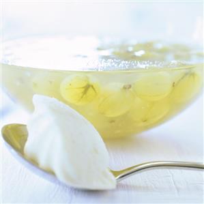 Cold gooseberry soup and a spoonful of ice cream