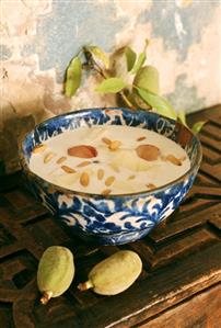 Spanish almond soup in blue and white bowl