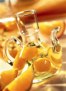 Orange and lemon oil in carafe