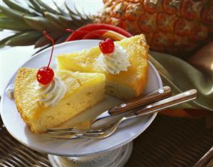 Two pieces of pineapple cake with cream & cocktail cherries (2)