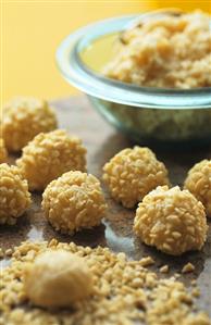 Coconut balls with chopped nuts