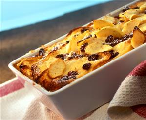 Funeral pyre (bread pudding) with raisins & icing sugar