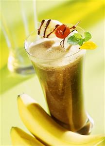 Coffee smoothie with bananas and fruit kebab