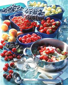 Still life with fresh fruit and berries for jam