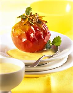 Baked apple with nougat filling and custard